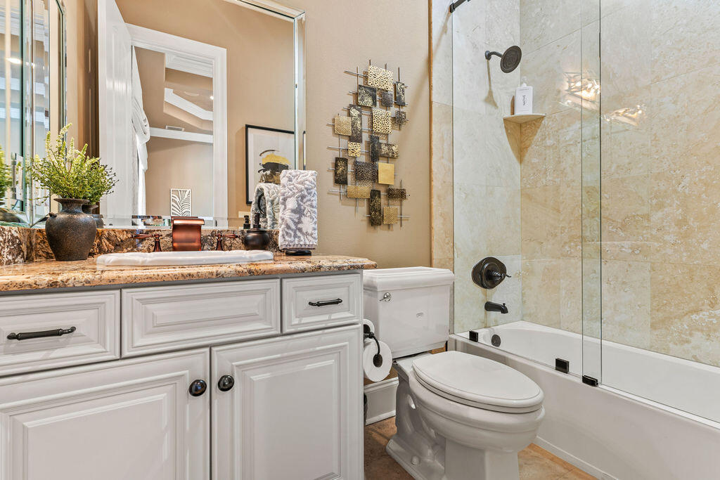 20 St Barts Bay Destin, FL 32541 - Photo 39 of 93 a bathroom with a sink a toilet and shower