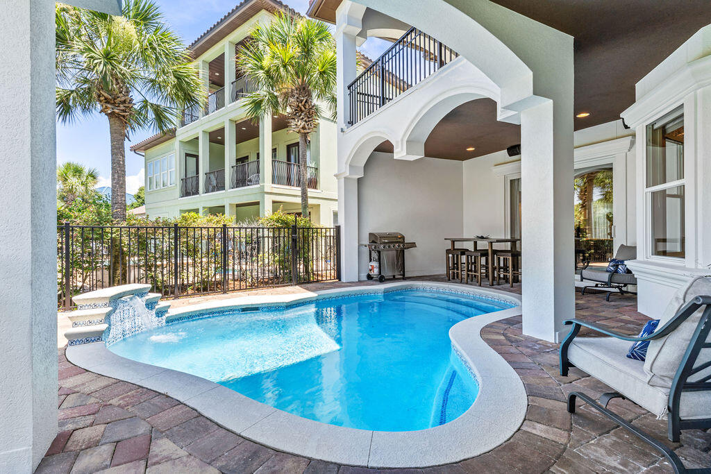 20 St Barts Bay Destin, FL 32541 - Photo 56 of 93 a view of a house with swimming pool and sitting area
