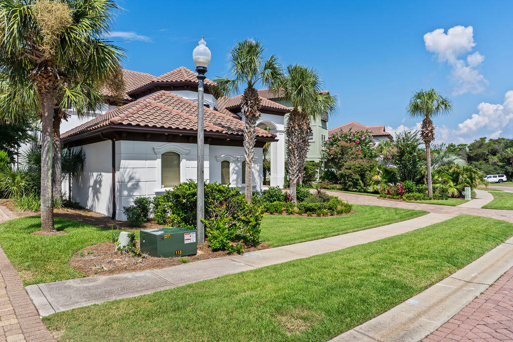 20 St Barts Bay Destin, FL 32541 - Photo 68 of 93 a front view of a house with a garden