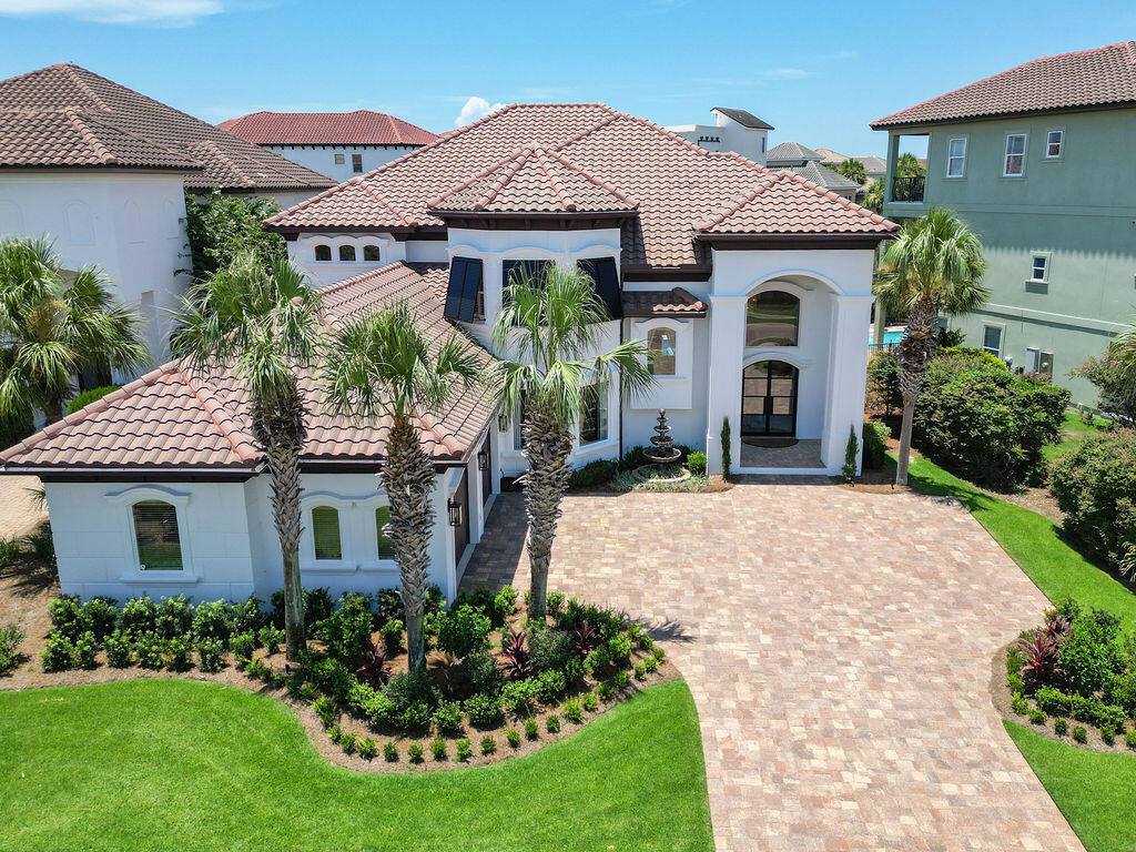 20 St Barts Bay Destin, FL 32541 - Photo 76 of 93 a front view of a house with a garden