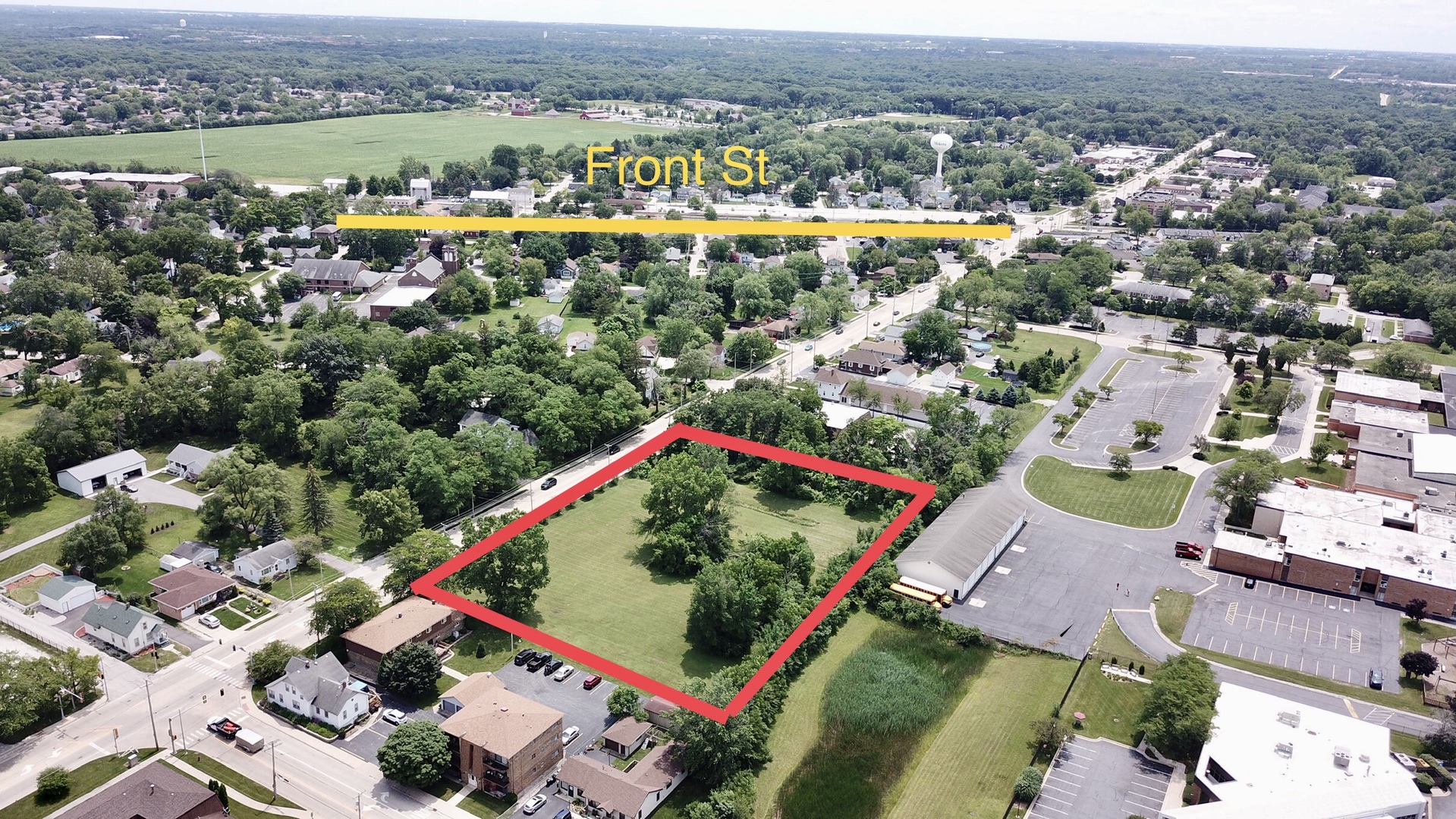 19550 Wolf Road Mokena, IL 60448 - Photo 2 of 4 an aerial view of a houses with a swimming pool