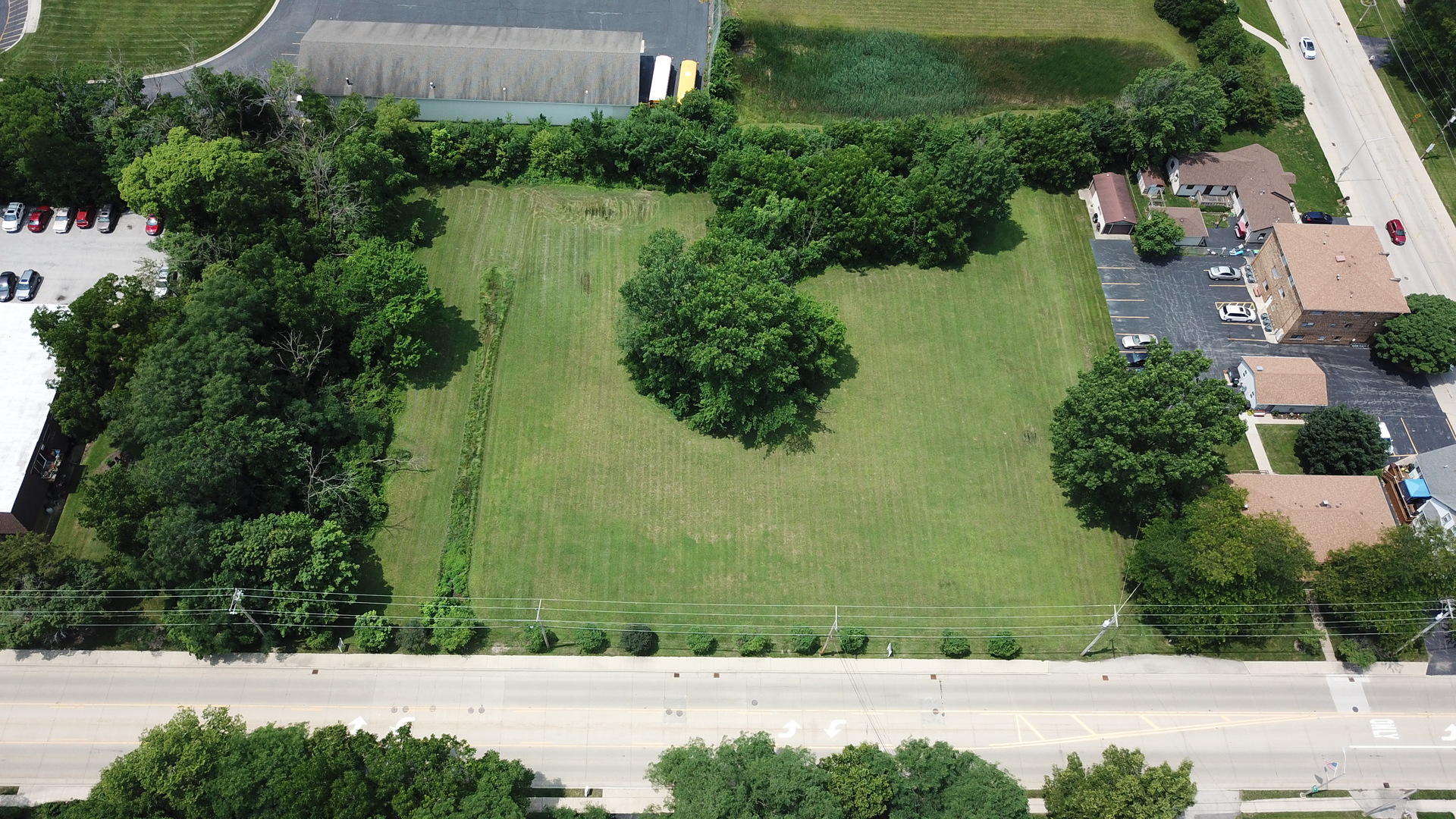 19550 Wolf Road Mokena, IL 60448 - Photo 3 of 4 an aerial view of residential house with outdoor space and lake view
