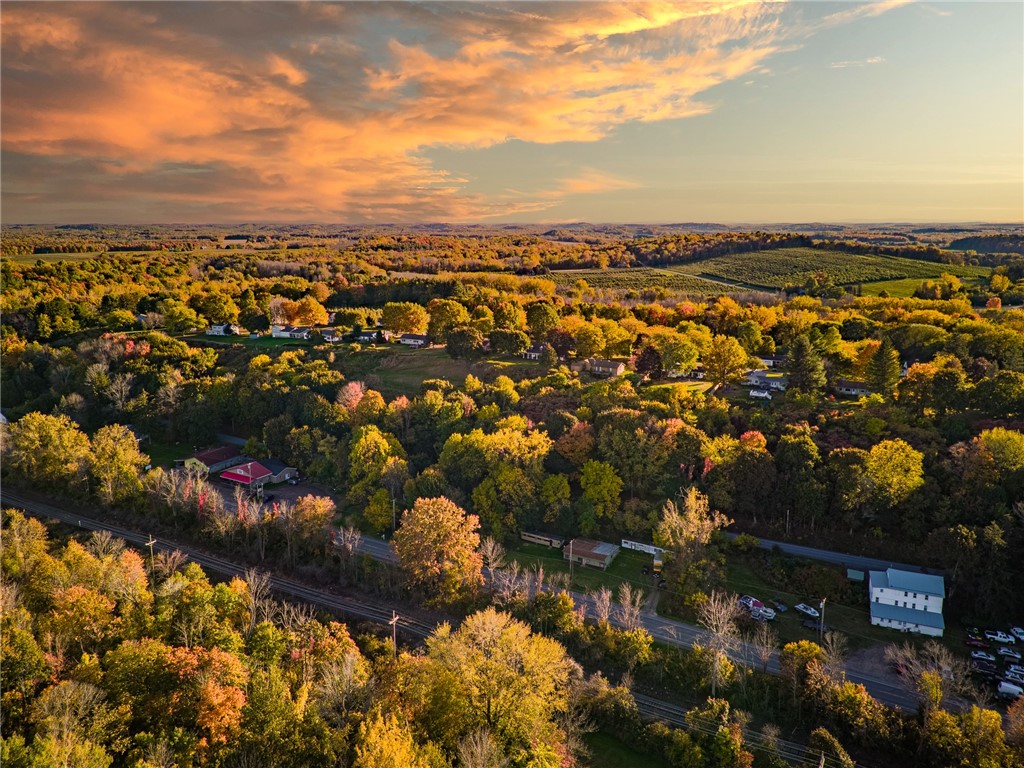 6944 Ridge Road Sodus, NY 14551 - Photo 2 of 4 How’s that for an INCREDIBLE SKY LINE!? Sodus offe