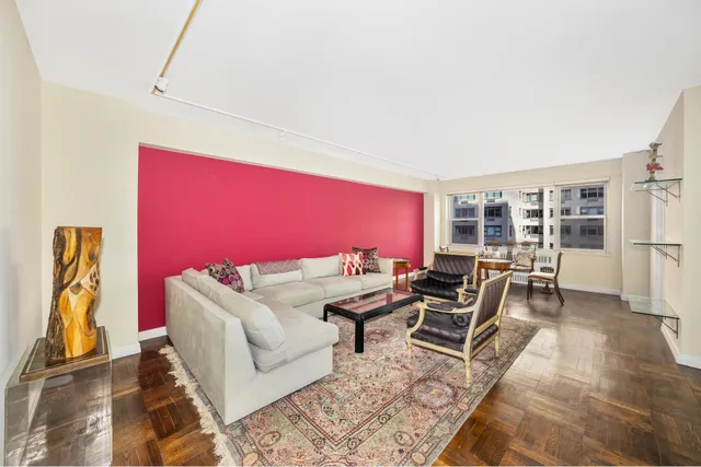a kitchen with a sink a stove and cabinets