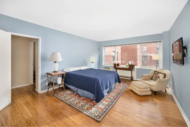 a bedroom with a bed and furniture