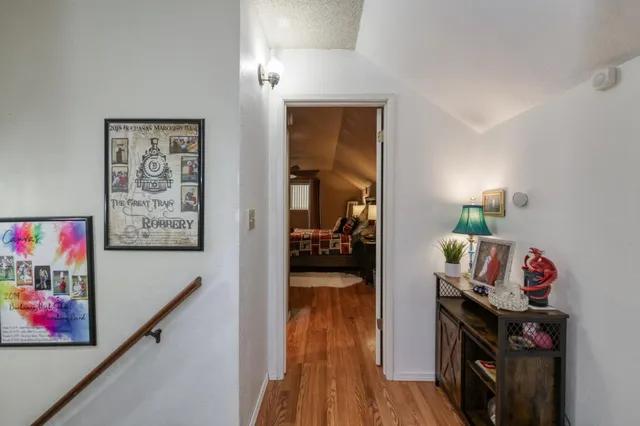 a view of a livingroom with wooden floor and closet