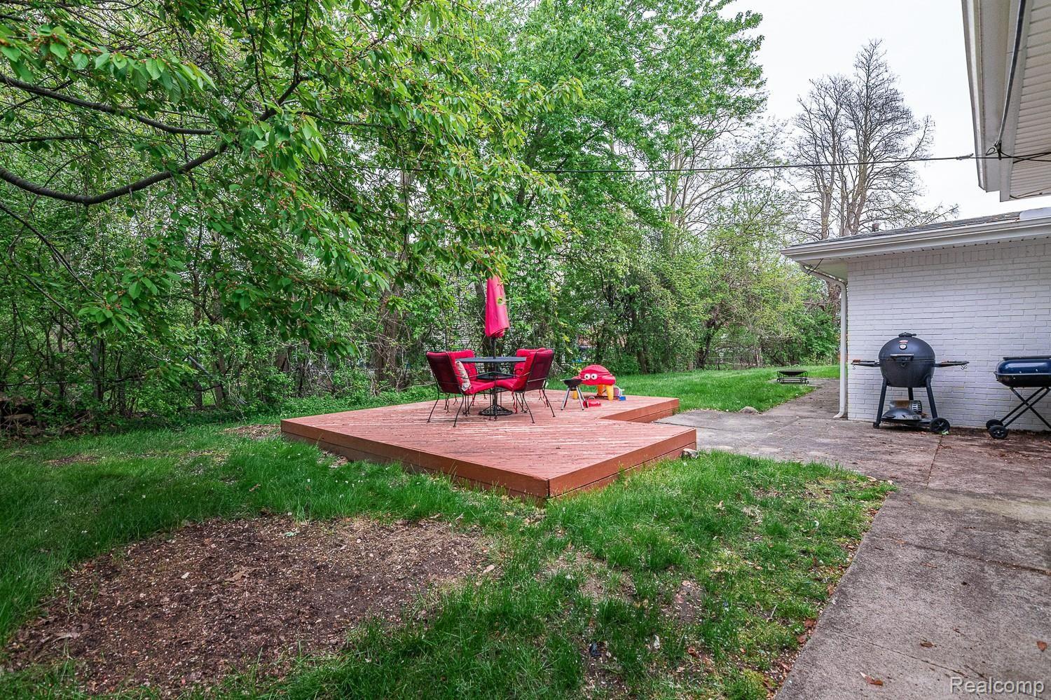 219 Barrington Road Bloomfield Hills, MI 48302 - Photo 27 of 30 Private deck to enjoy wooded yard