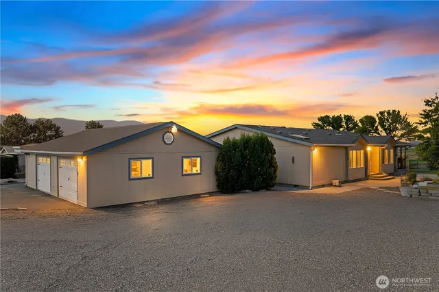 a view of a house with a street
