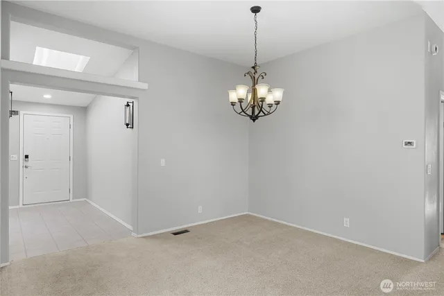 a view of a chandelier in a room