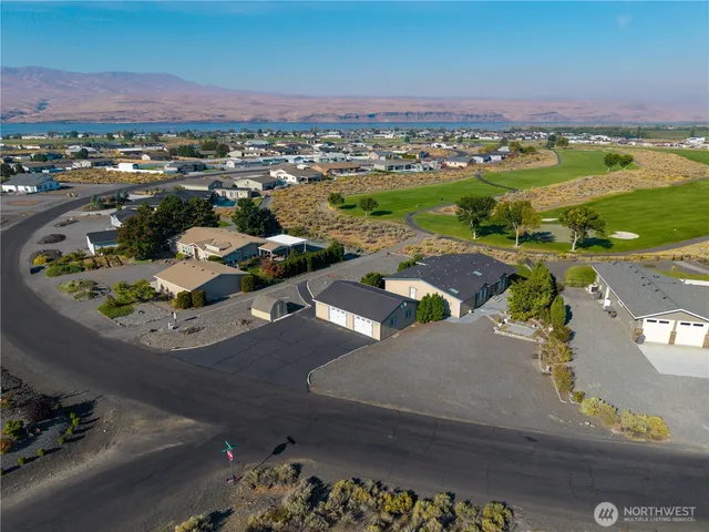 an aerial view of a house with a outdoor space