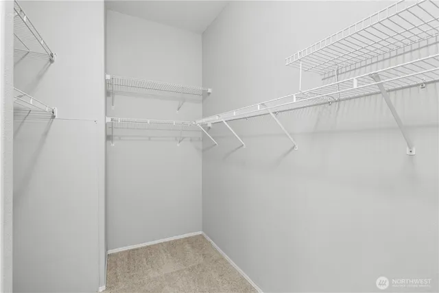 a view of a room with racks on the wall