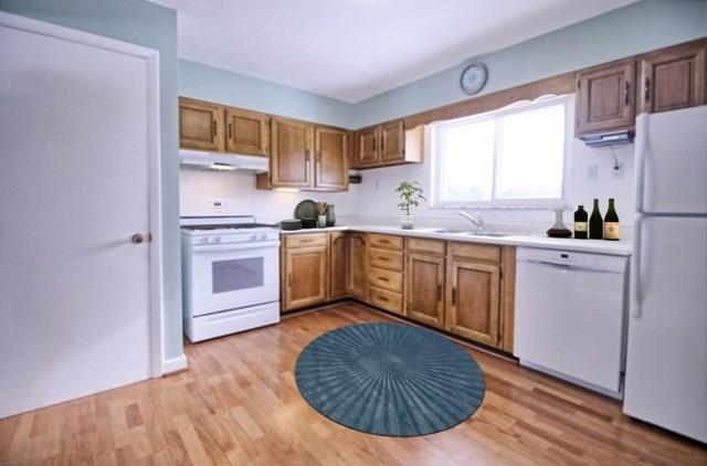 3133 Robinson Run Road McDonald, PA 15057 - Photo 7 of 24 Hardwood floors continue into the spacious eat-in kitchen.