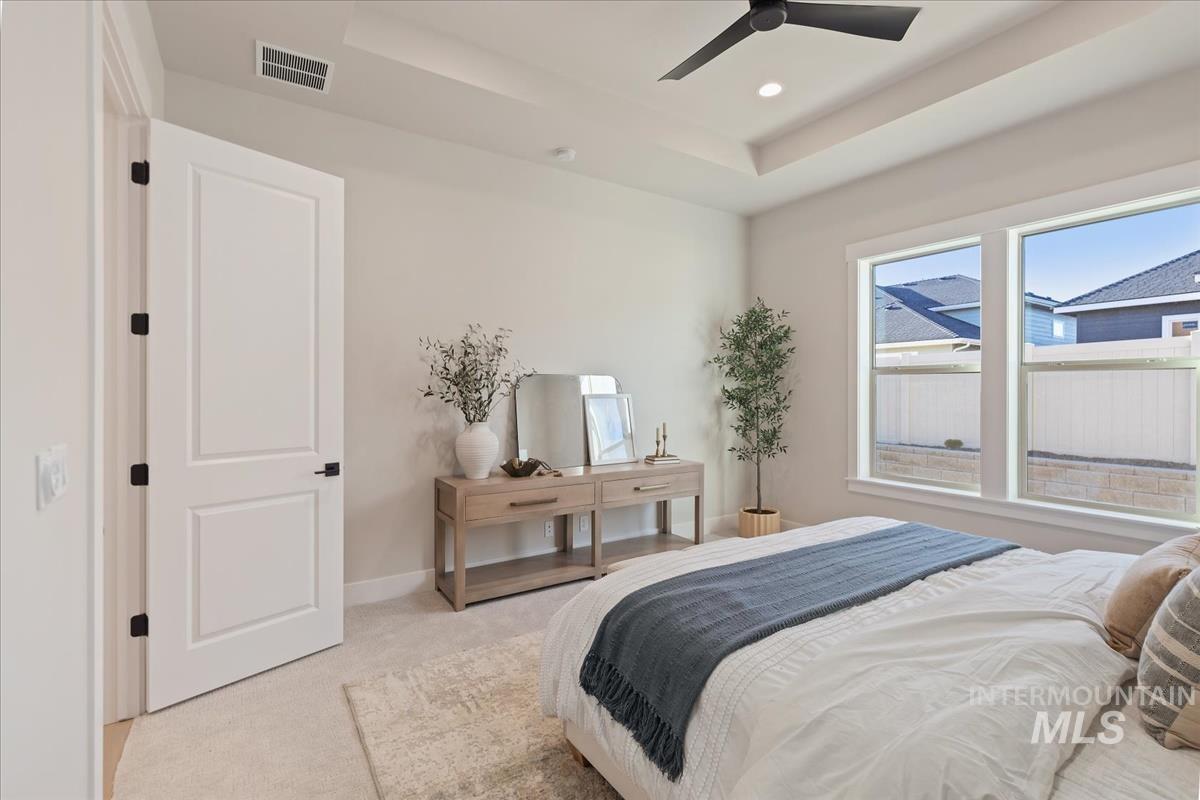 7355 Powell Place Eagle, ID 83714 - Photo 17 of 37 Recessed ceiling with an integrated ceiling fan and additional lighting