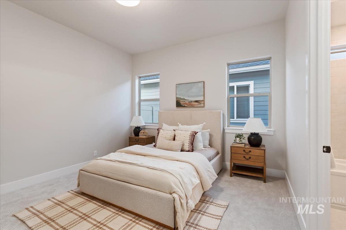 7355 Powell Place Eagle, ID 83714 - Photo 25 of 37 Carpeted room with neutral wall tones