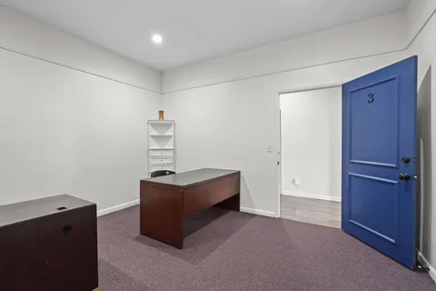 a room with furniture and a window