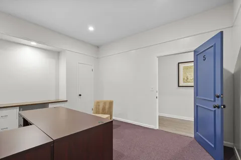 an empty room with windows