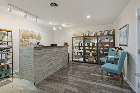 a room that has a table and chair in it