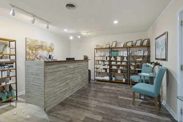 a room that has a table and chair in it