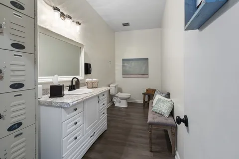 a view of a livingroom with furniture and front door