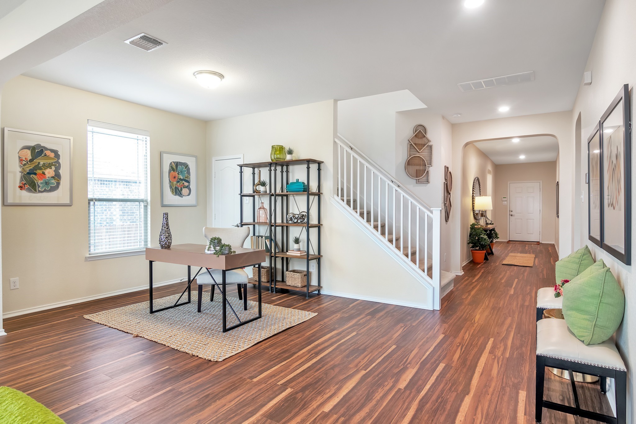 1075 Toltec Trail Georgetown, TX 78626 - Photo 15 of 32 a view of a livingroom with furniture wooden floor and windows
