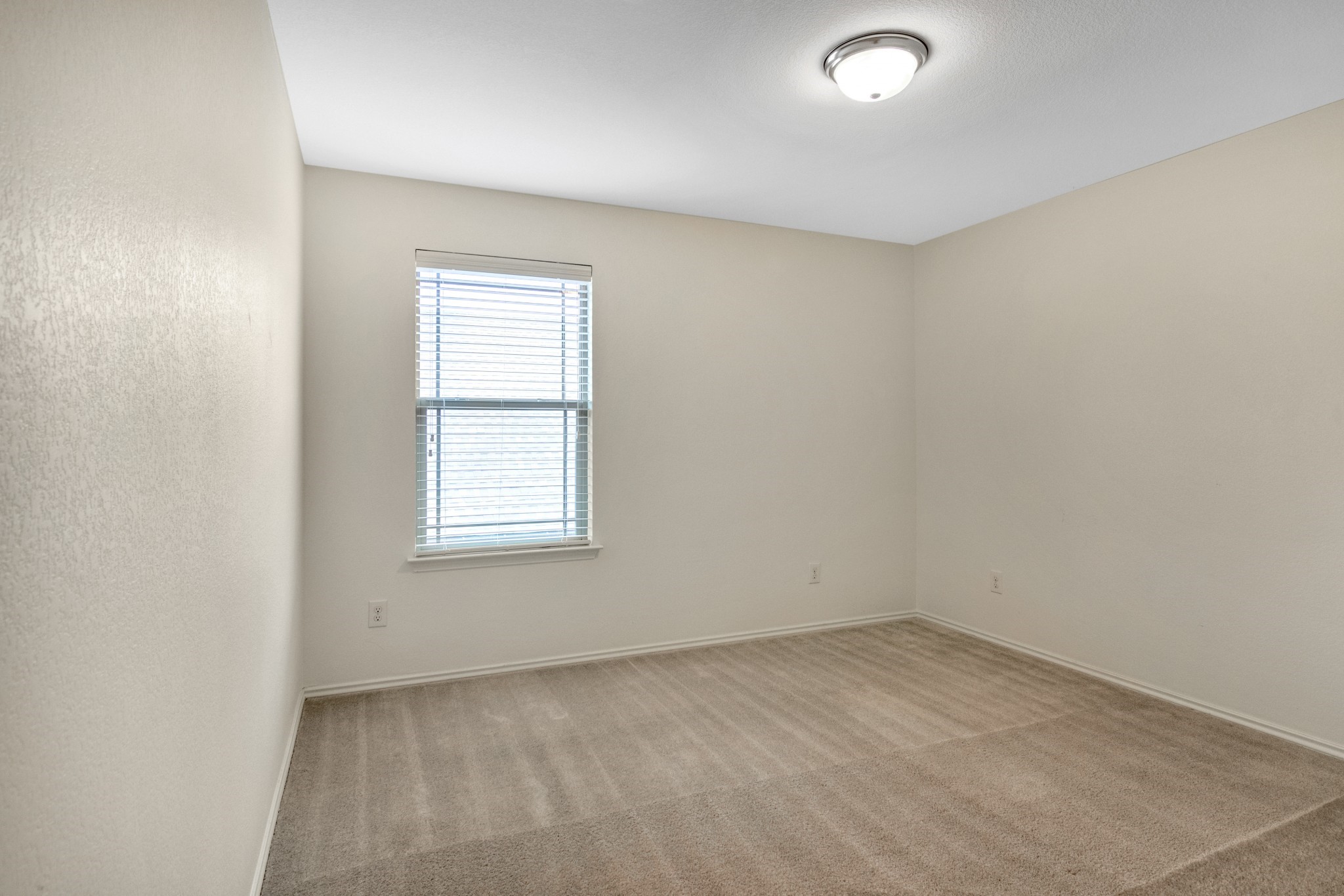 1075 Toltec Trail Georgetown, TX 78626 - Photo 18 of 32 an empty room with a window