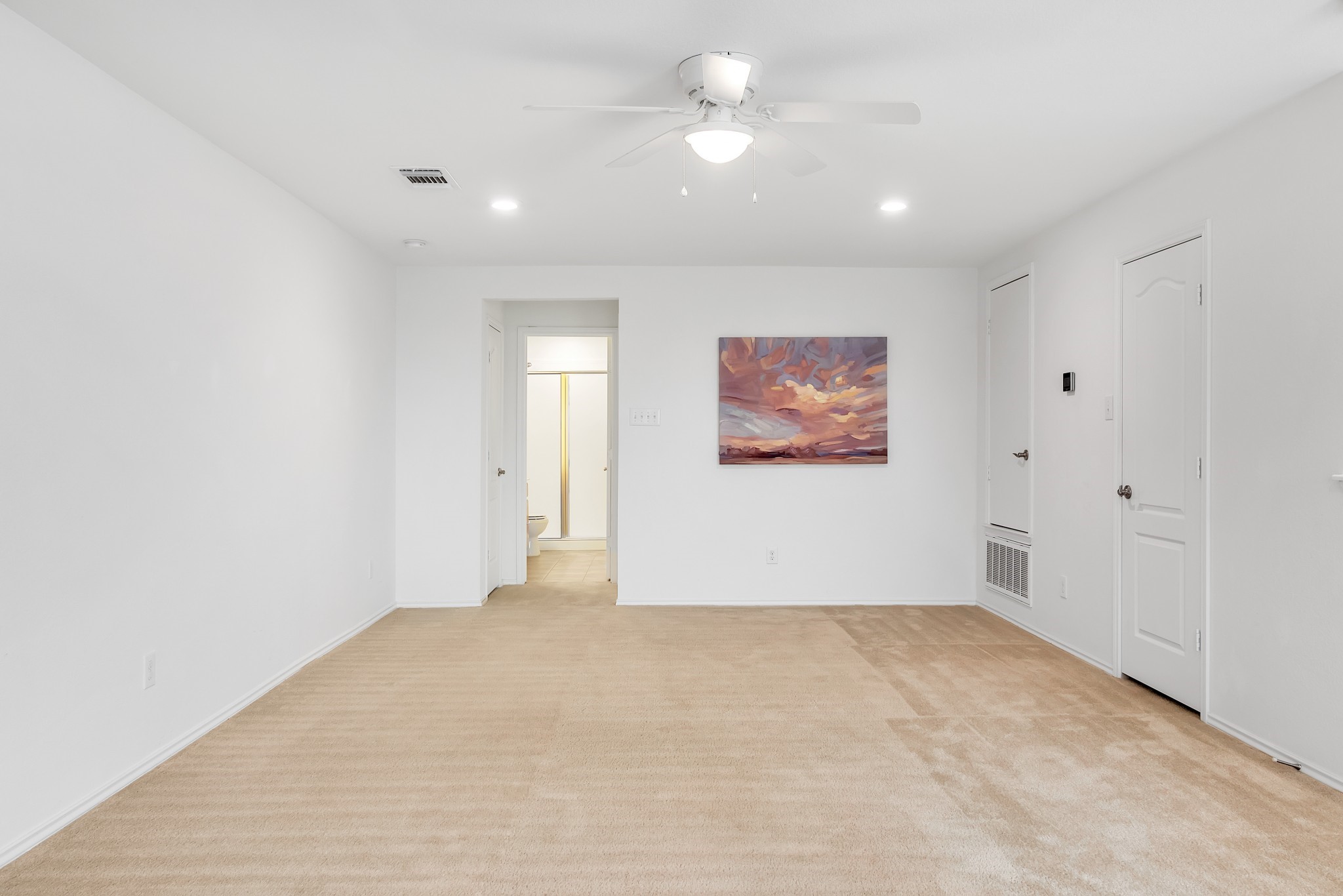 1075 Toltec Trail Georgetown, TX 78626 - Photo 20 of 32 an empty room with a ceiling fan and a window