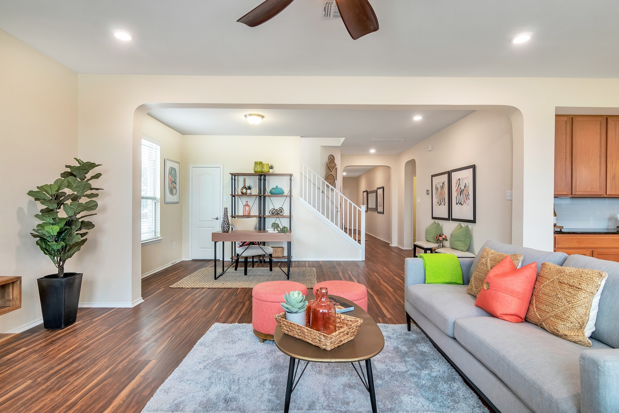 1075 Toltec Trail Georgetown, TX 78626 - Photo 2 of 32 a living room with furniture and wooden floor
