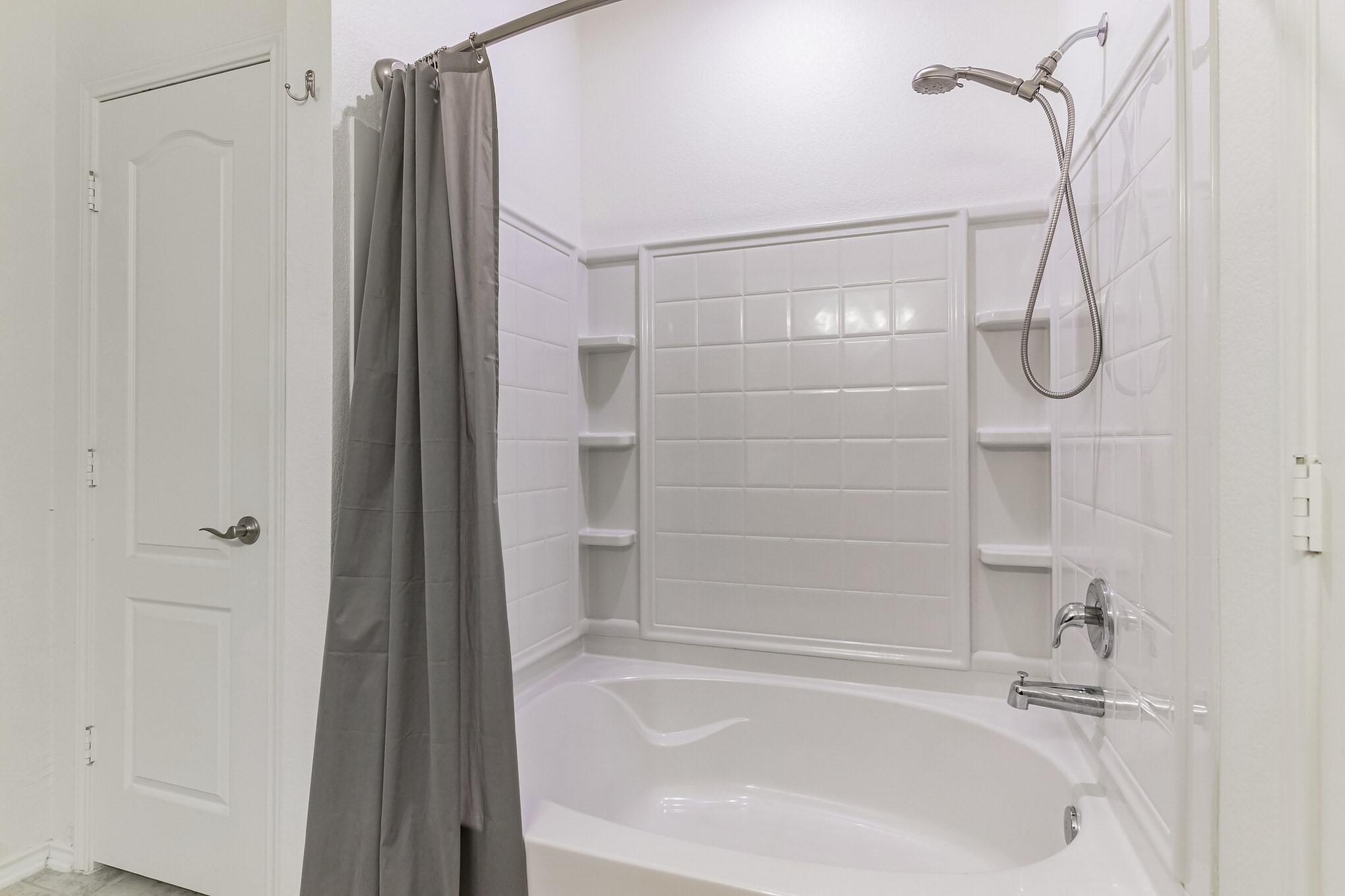 1075 Toltec Trail Georgetown, TX 78626 - Photo 23 of 32 a bathroom with a bathtub and a shower