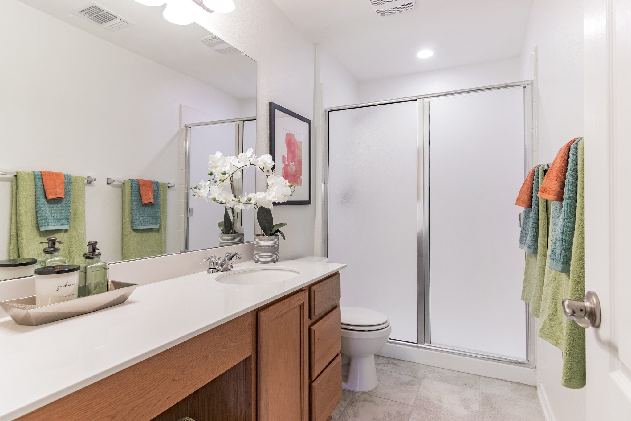 1075 Toltec Trail Georgetown, TX 78626 - Photo 25 of 32 a bathroom with a sink a toilet and shower curtain