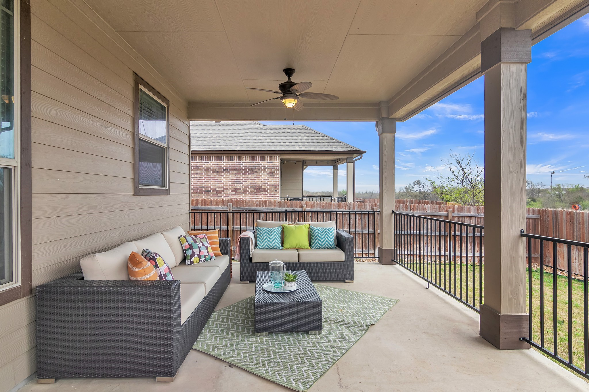 1075 Toltec Trail Georgetown, TX 78626 - Photo 9 of 32 a living room with furniture and a floor to ceiling window