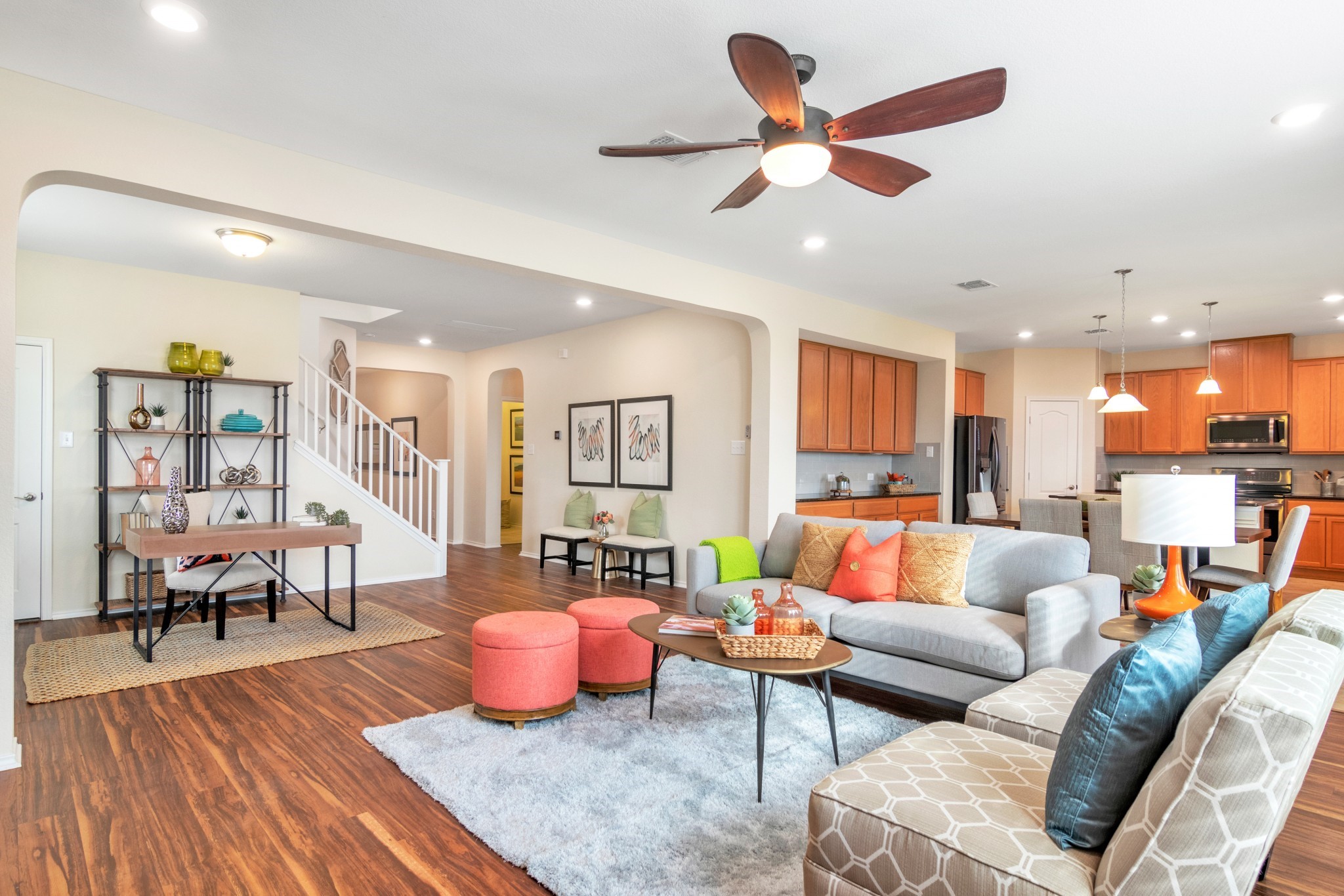 1075 Toltec Trail Georgetown, TX 78626 - Photo 10 of 32 a living room with furniture kitchen view and a wooden floor