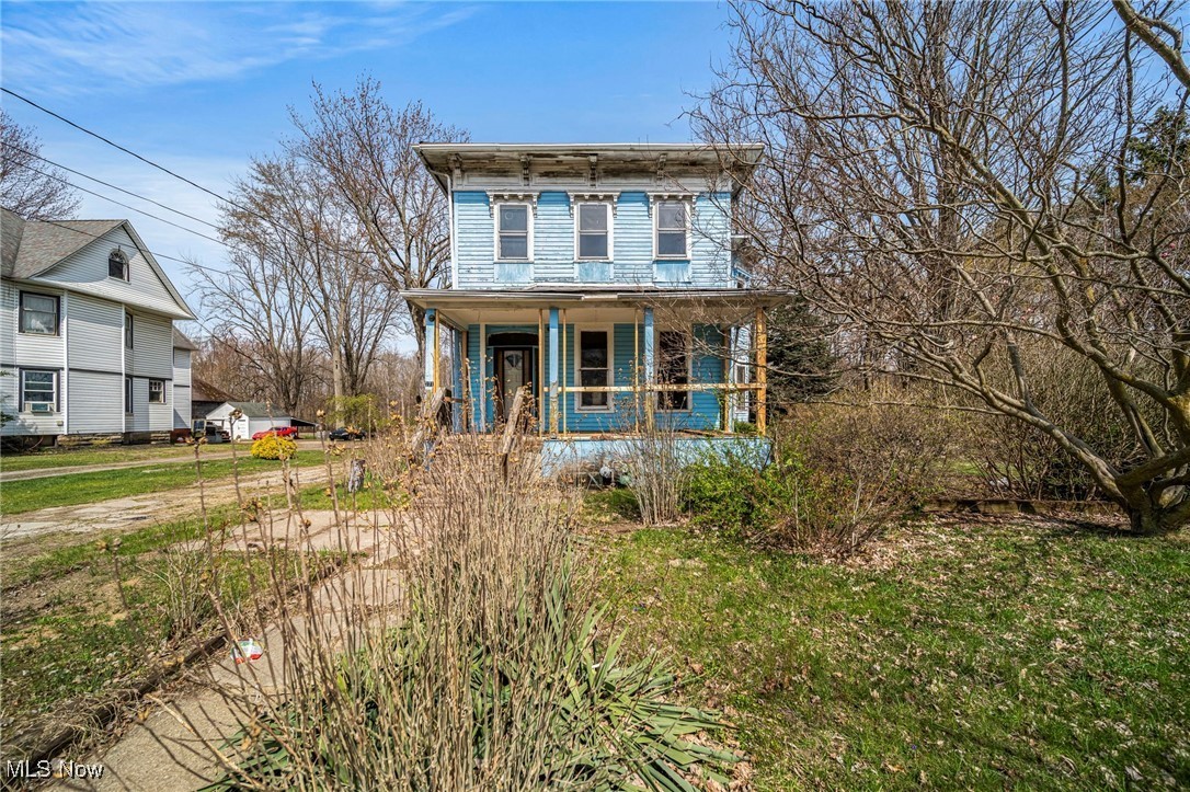 3501 Padanarum Road Geneva, OH 44041 - Photo 1 of 2 Italianate house with a porch