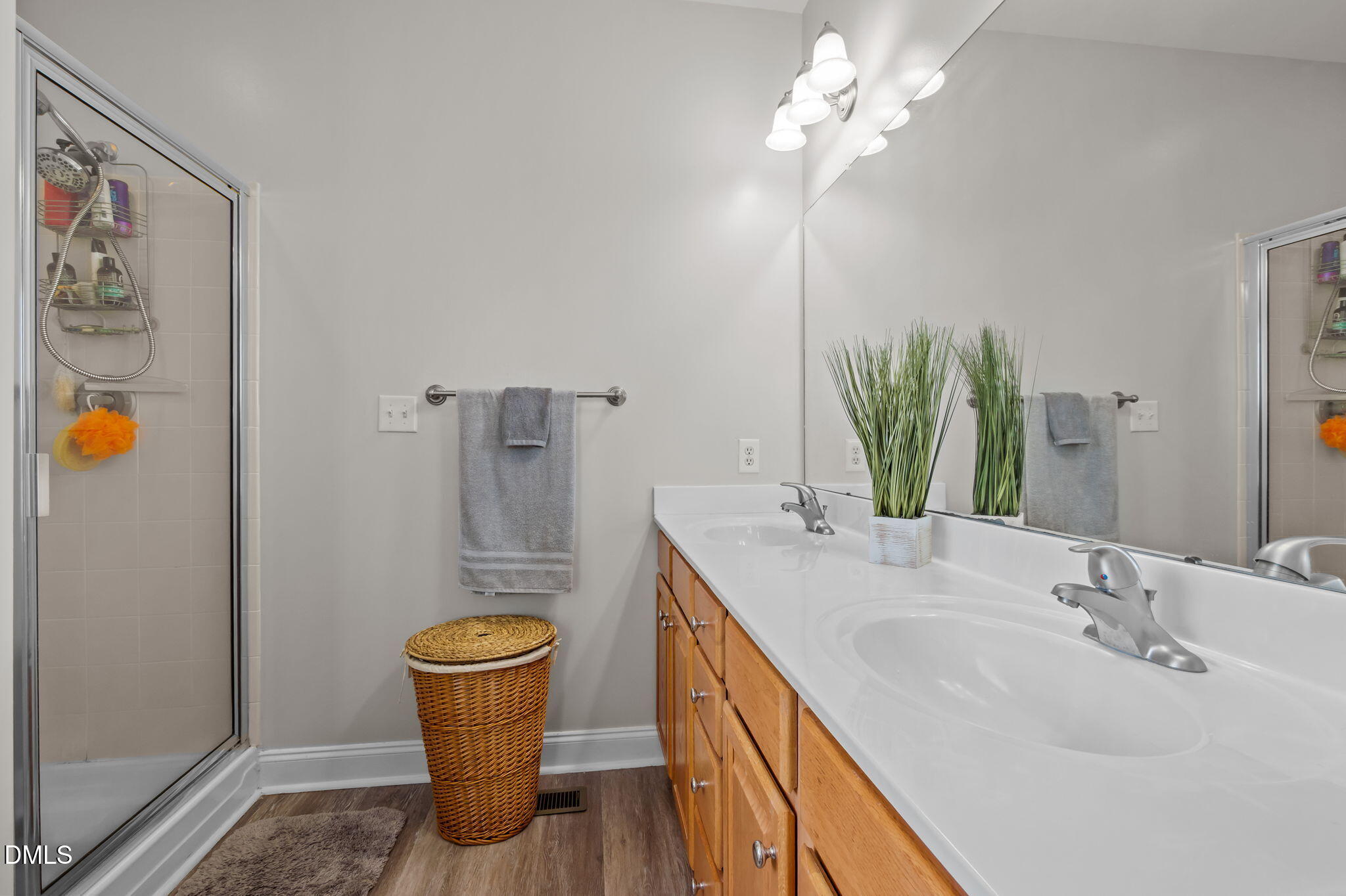 142 Water Front Lane Timberlake, NC 27583 - Photo 17 of 45 a bathroom with a sink and a mirror