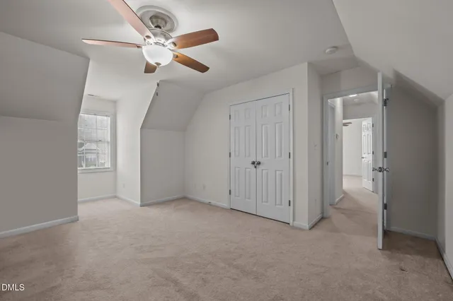 a view of a balcony with wooden floor and city view