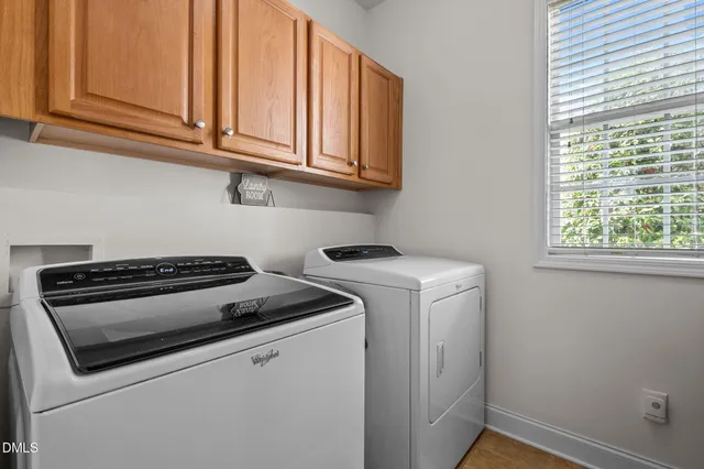 a view of balcony with wooden floor and fence