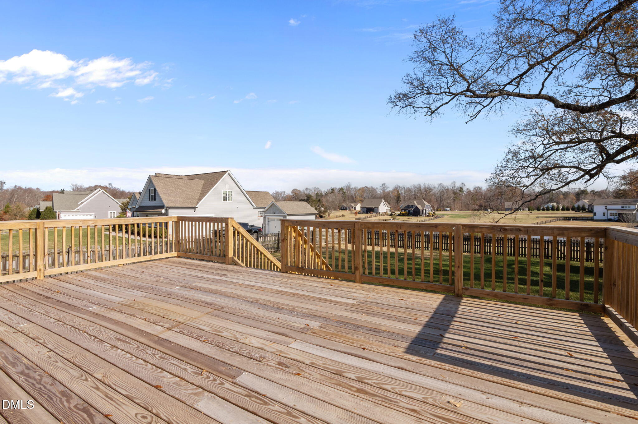 142 Water Front Lane Timberlake, NC 27583 - Photo 26 of 45 a view of a balcony with wooden floor and city view
