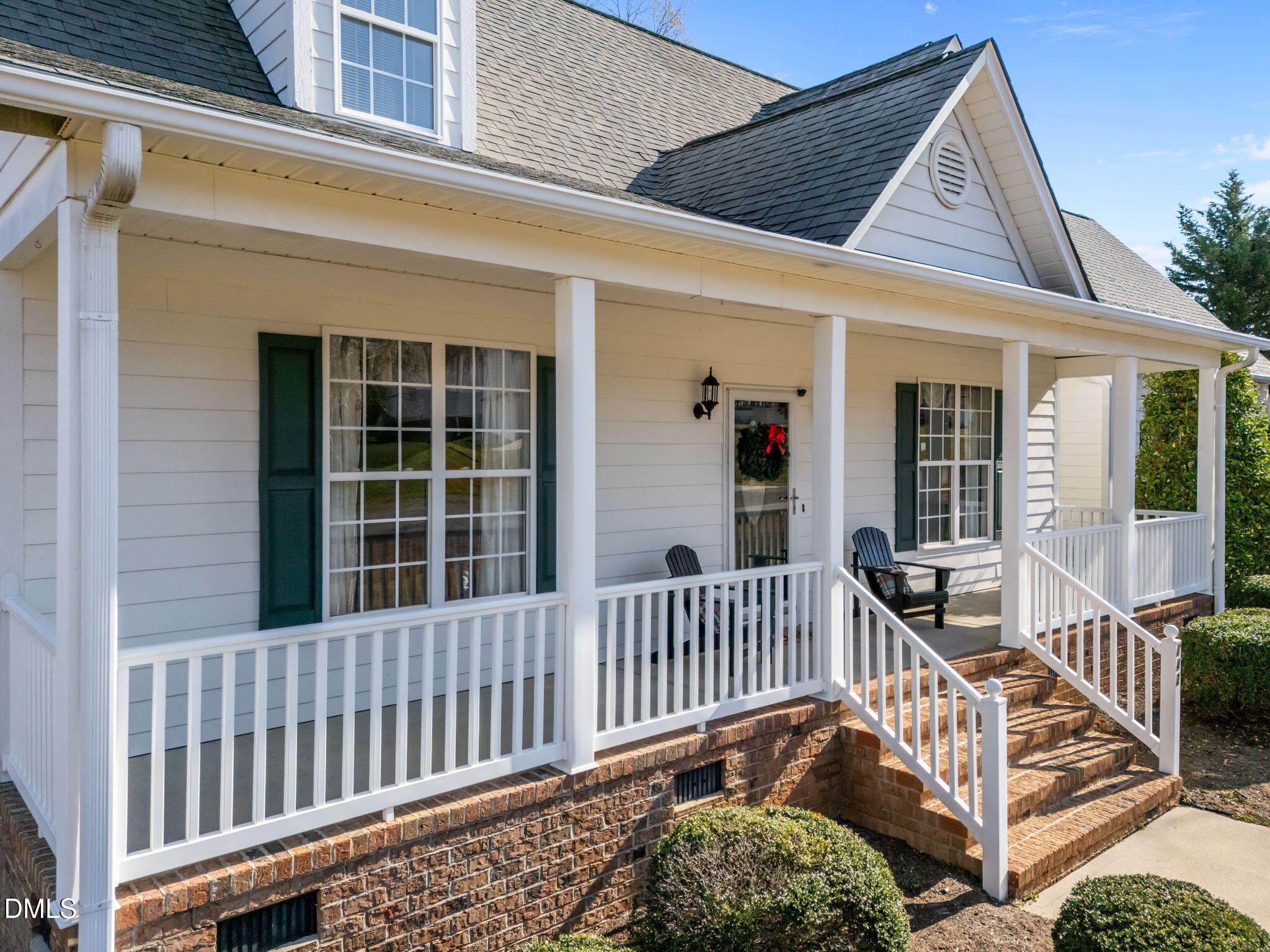 142 Water Front Lane Timberlake, NC 27583 - Photo 41 of 45 front view of a house with a porch