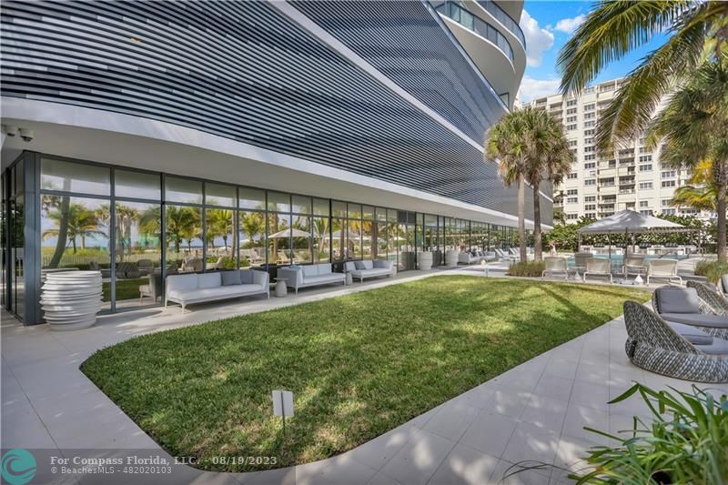 730 North Ocean Boulevard, Unit 503 Pompano Beach, FL 33062 - Photo 65 of 85 a view of a house with a backyard porch and sitting area