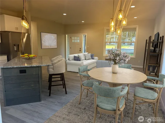 a view of a dining room with furniture