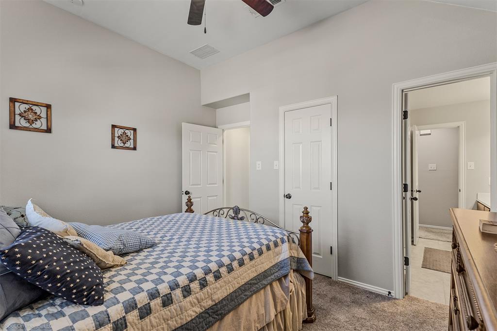 766 Sycamore Trail Forney, TX 75126 - Photo 25 of 37 a bedroom with a bed and a window
