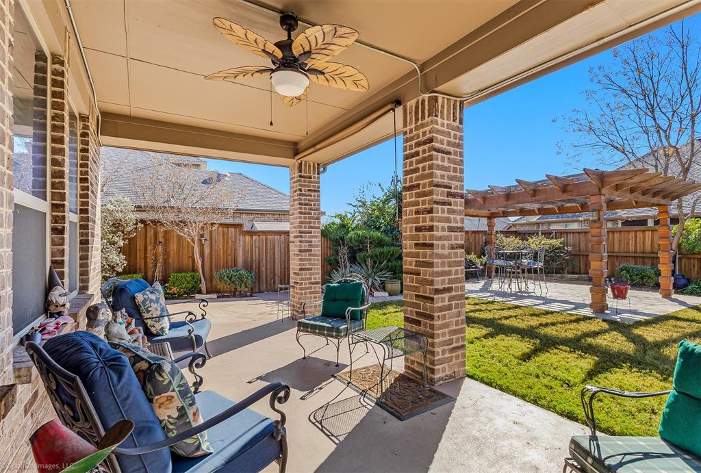 766 Sycamore Trail Forney, TX 75126 - Photo 32 of 37 a view of a patio with a table and chairs