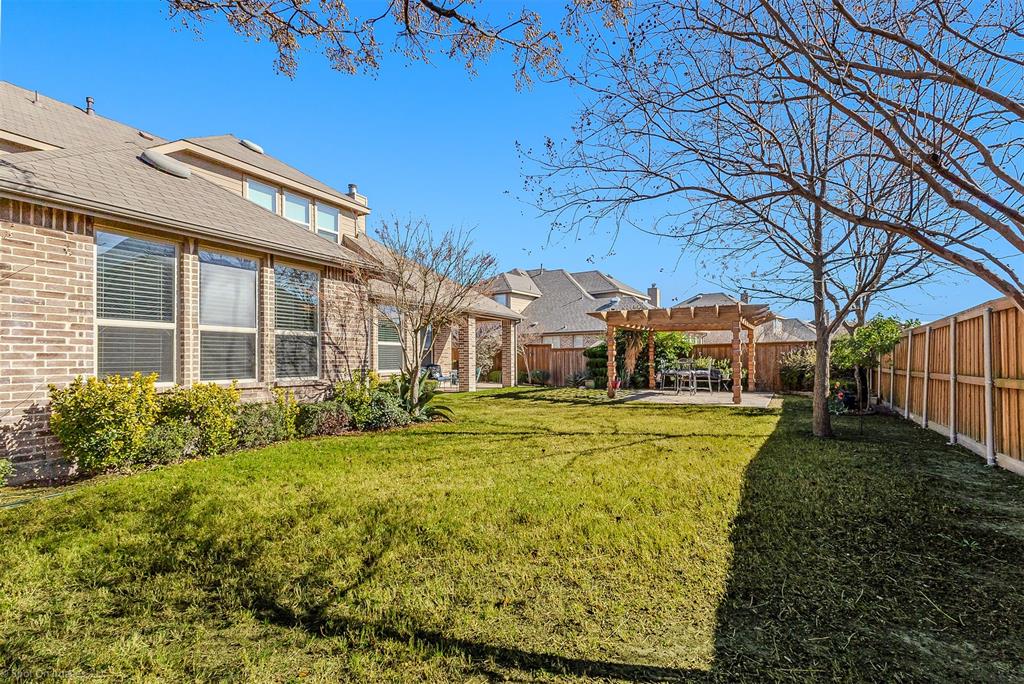 766 Sycamore Trail Forney, TX 75126 - Photo 36 of 37 a front view of a house with a yard