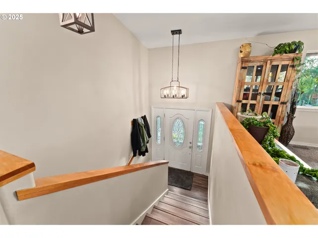 a view of a living room and entryway