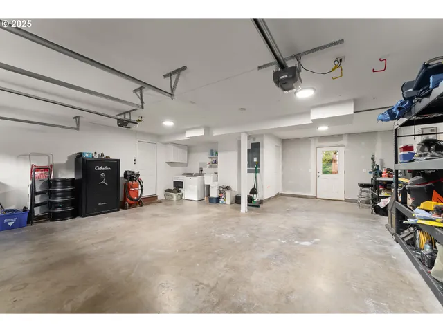 a view of a big room with air conditioner duct and materials on floor