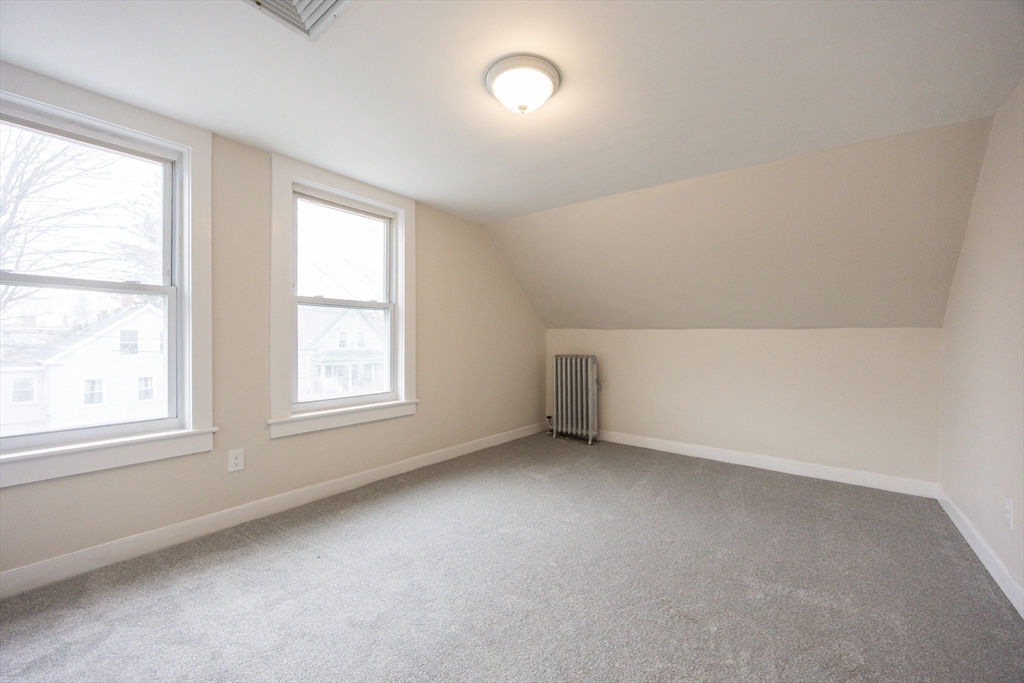 57 Pine Street Milford, MA 01757 - Photo 21 of 29 an empty room with a window