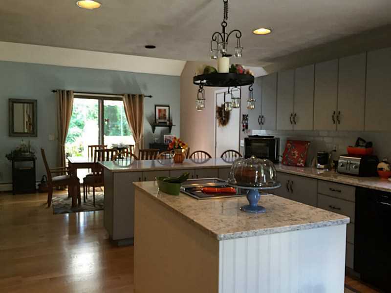 3 Justin Street Warren, RI 02885 - Photo 2 of 7 Kitchen. Nicely updated quartz kitchen with beautiful hardwood flooring throughout.