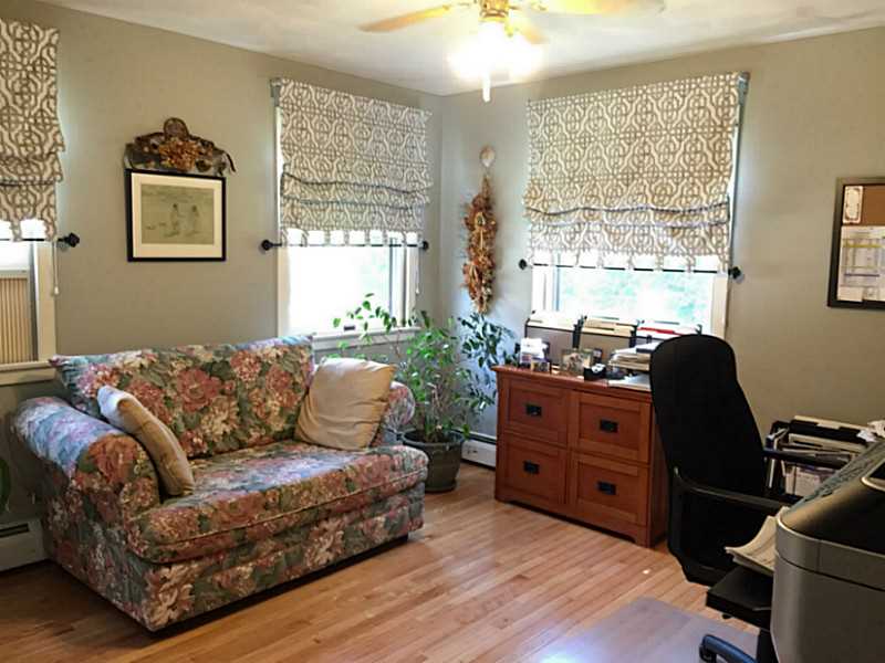 3 Justin Street Warren, RI 02885 - Photo 4 of 7 Studio/Study/Office. 1st floor bedroom currently used as office ~ study. Huge closet storage.