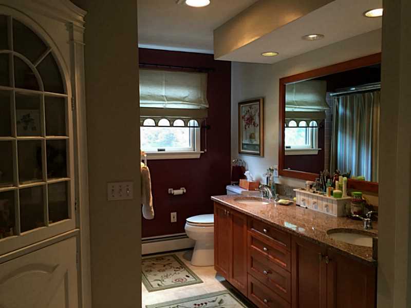 3 Justin Street Warren, RI 02885 - Photo 5 of 7 Bathroom. Large Quartz tiled bath with double sinks & jacc tub/shower.