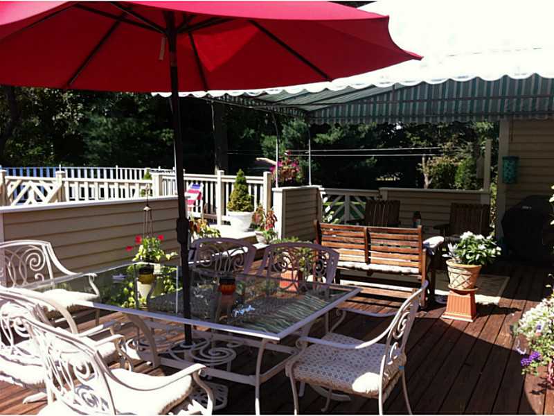 3 Justin Street Warren, RI 02885 - Photo 6 of 7 Patio/Deck. Entertainers delight! 36 x16 deck area to private yard.