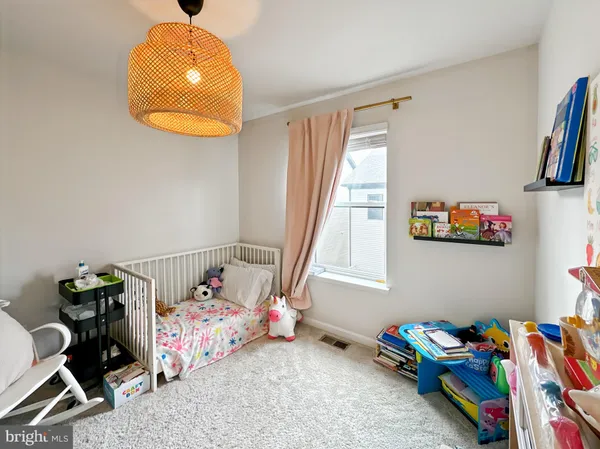 a storage room with furniture and a window